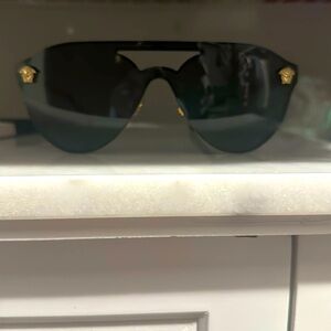 Black Versace glasses never worn in Versace case
